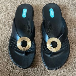Oka B black flip flops. Size Med